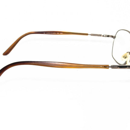 Safilo Women's Eyeglasses Elasta 4781 ZL6 Multi-Color - Gold Metal Frame has a Tortoise pattern on the front of the frame. Oval Frame Italy 54[]16 130