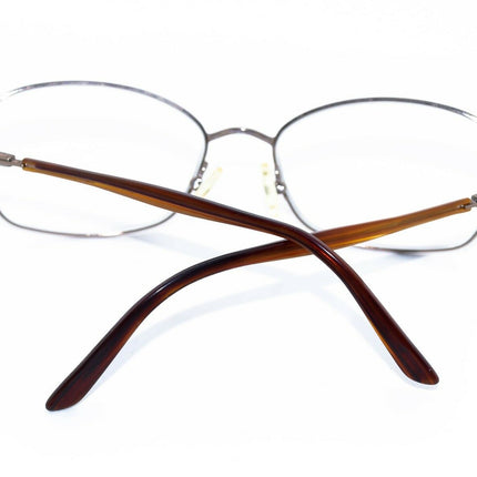 Safilo Women's Eyeglasses Elasta 4781 ZL6 Multi-Color - Gold Metal Frame has a Tortoise pattern on the front of the frame. Oval Frame Italy 54[]16 130